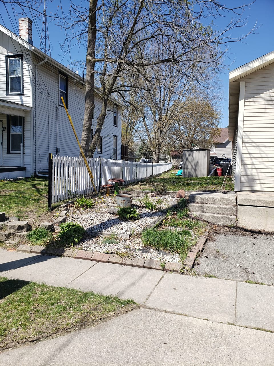 Restoring Charm in Ixonia: White Picket Fence Revitalized